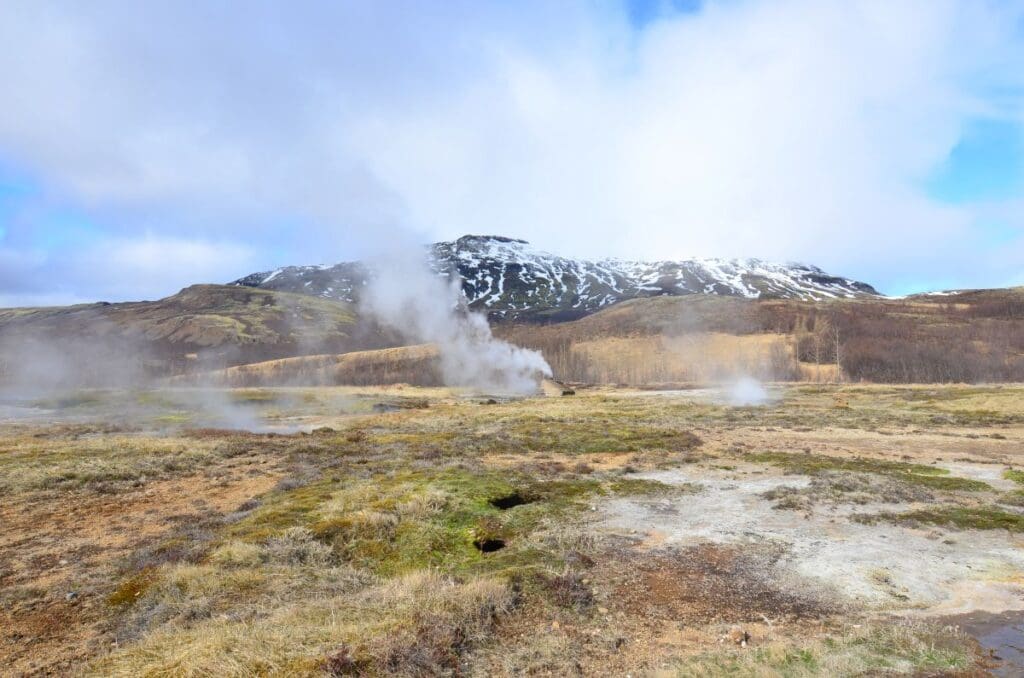 Image: A field in Iceland with a scenic view of the geysirs