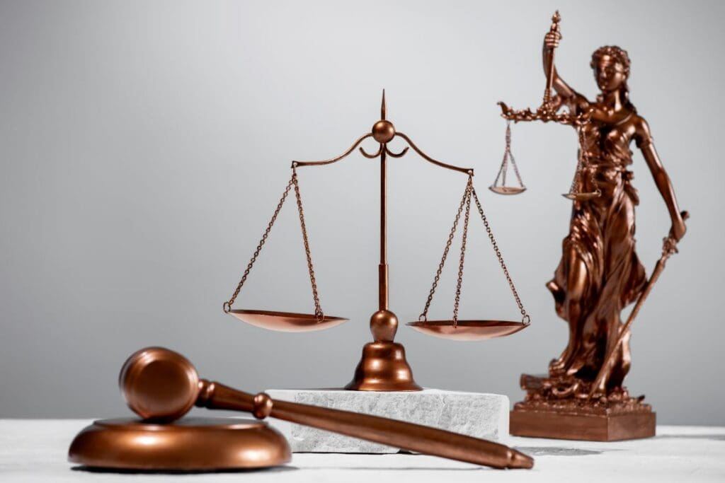 Still life with the scales of justice (climate,green justice, Youths sue Trump over US climate orders)