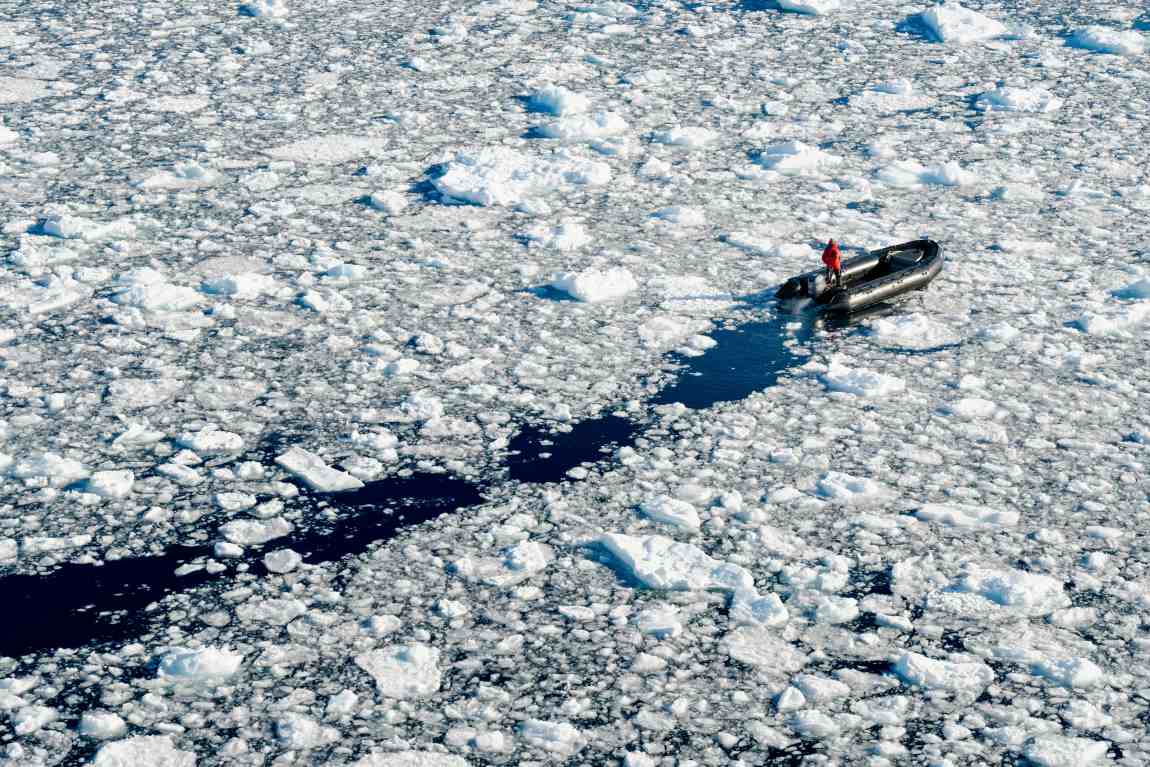 Image: Person on Pontoon on Frozen Sea
