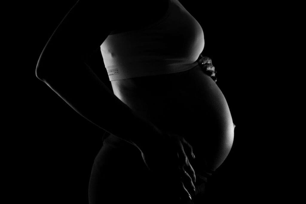 Gray scale Photo of a Pregnant Woman (s.climate, pollution, pregnancy)
