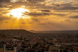 Home Image: sun is setting over a city and hills (Hargeisa, Somalia)
