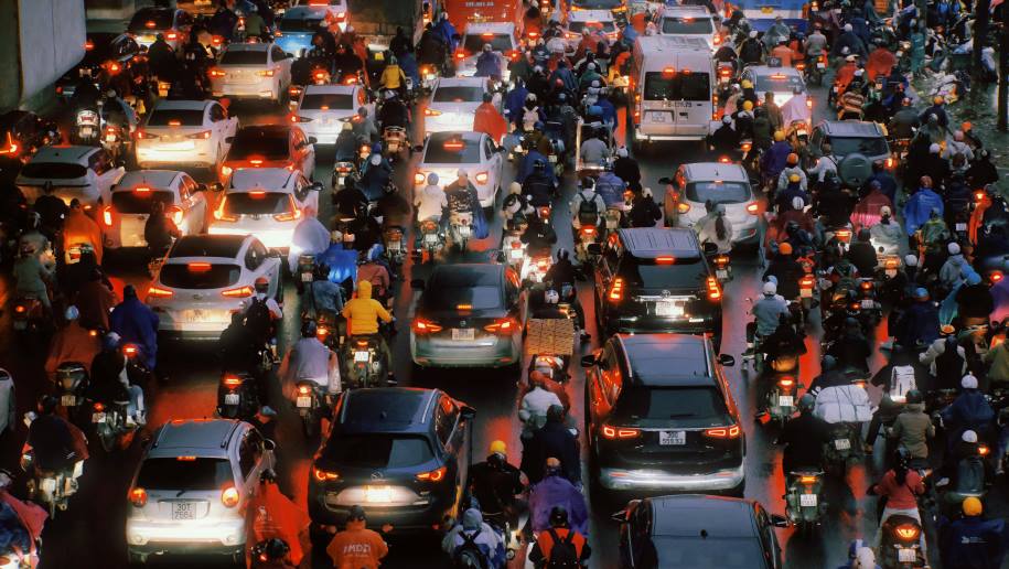 Image: Traffic congestion in Hanoi with cars and motorbikes after rain