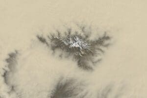 Home Satellite Image: On March 27, 2025, Landsat 8's Operational Land Imager (OLI) captured a break in the dust cloud over the southern Tarim Basin, briefly revealing the snow-covered peaks of the Tekilik Shan as a powerful spring dust storm swept across western China