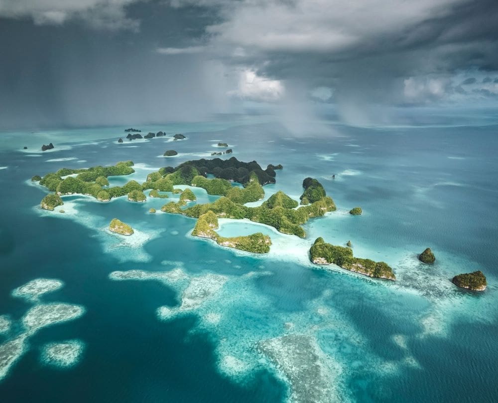 Image: aerial view of lush tropical islands surrounded by turquoise waters in Palau