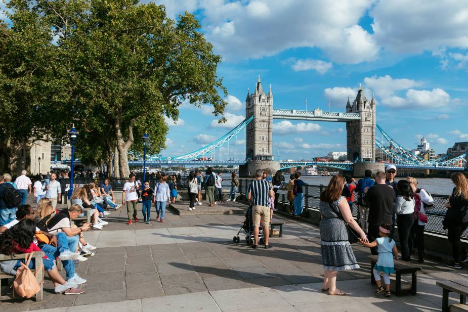 Home Image: group of people standing near bridge; heat; England, UK