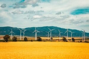 Home Image: View of large wind turbines producing clean sustainable energy