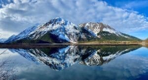 Home Image: body of water near a mountain